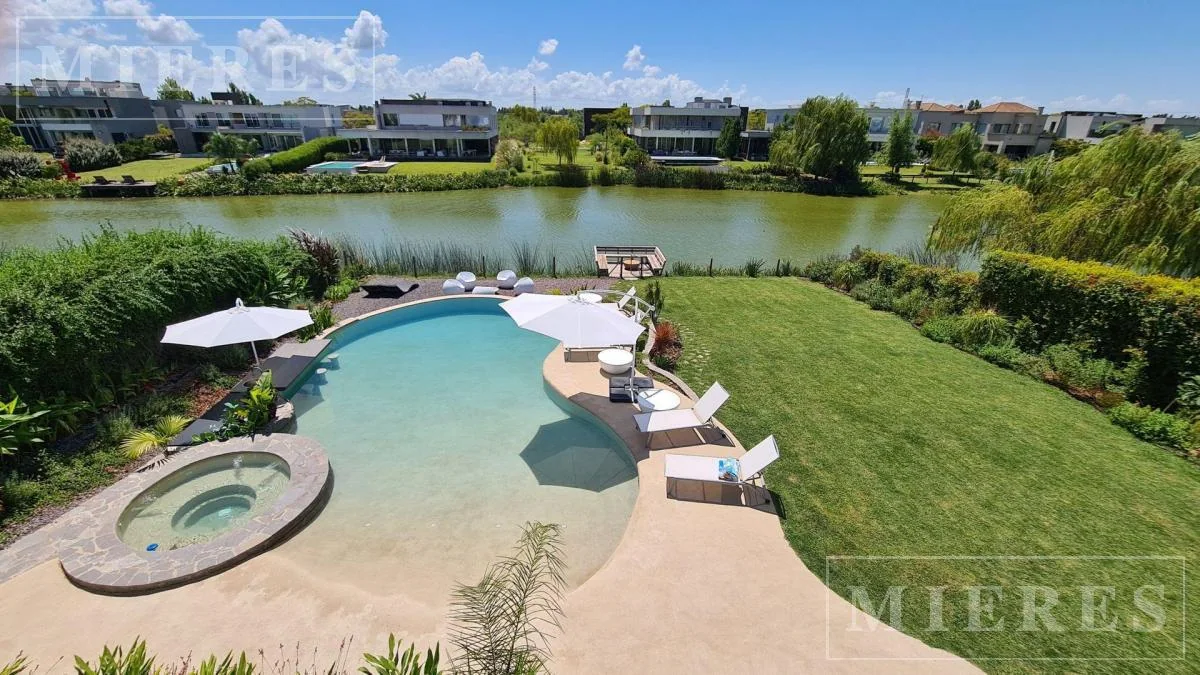 Luxury Lakefront House for Sale in El Golf, Nordelta — authorized listing photo 2